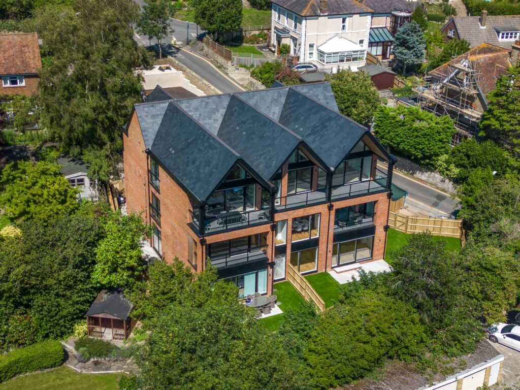 Exterior arial image of Bay Tree house surrounded by trees